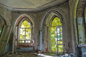 Old rotten doorway of an abandoned mansion of Khvostov  in gothic style 