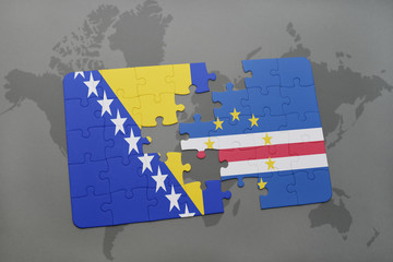 puzzle with the national flag of bosnia and herzegovina and cape verde on a world map