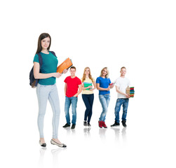 Fototapeta premium Large group of teenage students isolated on white background. Many different people standing together. School, education, college, university concept.