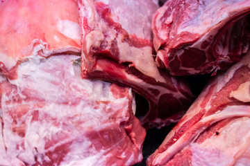 closeup of fresh raw meat of pork or lamb
