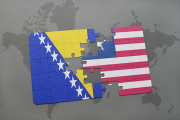 puzzle with the national flag of bosnia and herzegovina and liberia on a world map