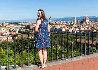 Girl at the Michelangelo Square in Florence, Italy in summer 201