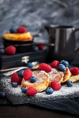 Cottage cheese pancakes decorated with fresh berries