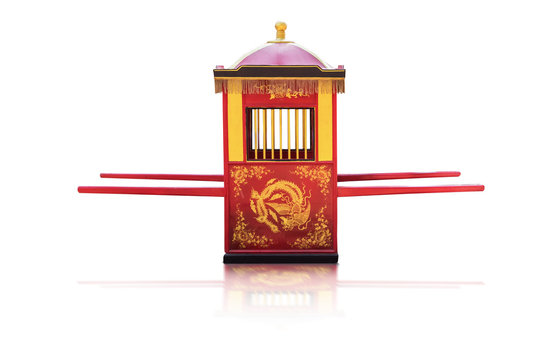 Traditional Chinese culture,Palanquin carrying the bride isolated on white background with clipping path.