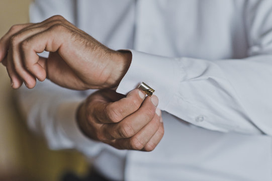 The Process Of Dressing Up A White Business Shirt Man 7442.