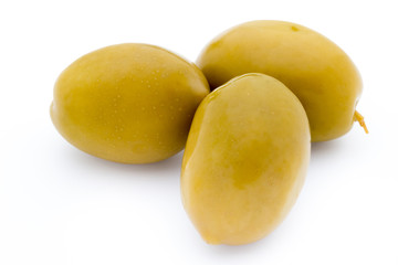 Green big olives on the white background.