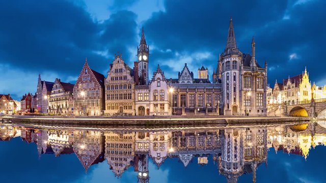 Ghent skyline reflecting in water in the evening, Belgium  (static image with animated sky and water)
