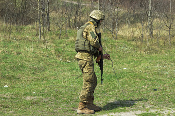 Military with kalashnikov at tactical exercises