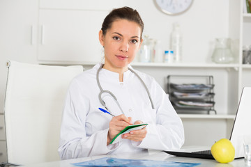 Female doctor in office