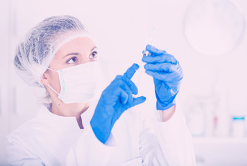 Nurse making injection
