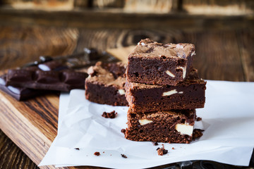 Chocolate brownies with cream cheese on baking paper