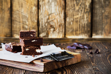 Chocolate brownies with cream cheese on baking paper