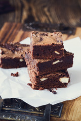 Chocolate brownies with cream cheese on baking paper
