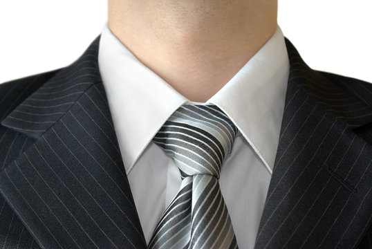 Man in a business suit closeup isolated on white background.