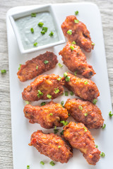Fried chicken wings with blue cheese sauce