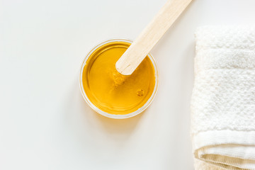 concept depilation with wax on white background top view