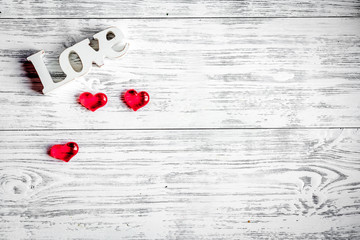 concept Valentine's Day with flower wooden background top view
