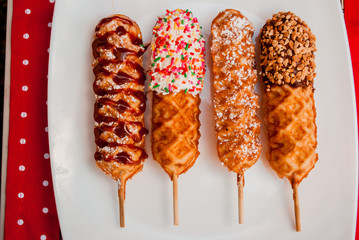 Belgian Waffle Sticks with candy and chocolate - 135503298