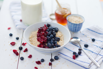 Porridge with cranberries and blueberries