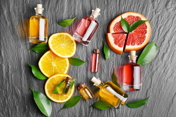 Aroma oil with citrus on dark background