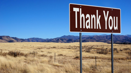 Thank You brown road sign