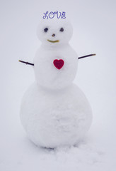 red heart and snowman. Happy Valentine's day.