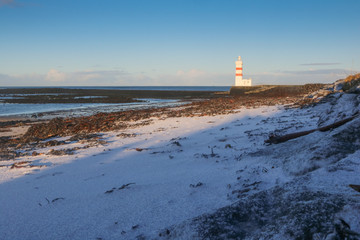 Beach and Old lighthouse, Gardskagi in Reykjanes, Iceland