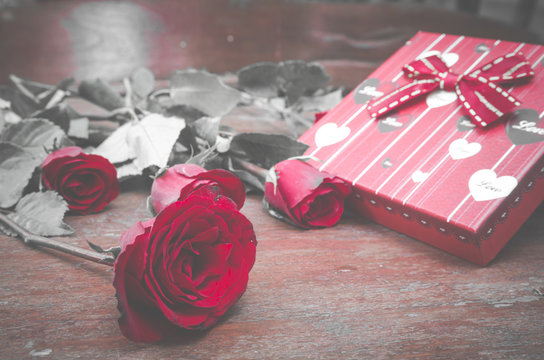 Valentine gift box with rose, vintage filter image