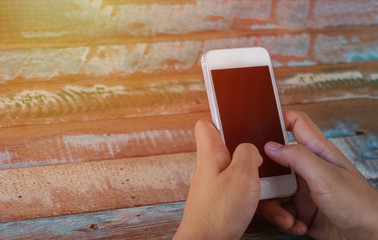 Woman use of smart phone in coffee shop