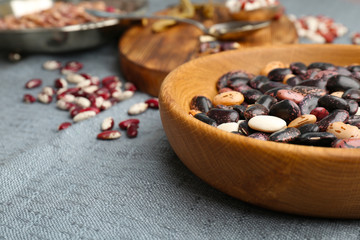 Closeup of bowl with haricot beans on table