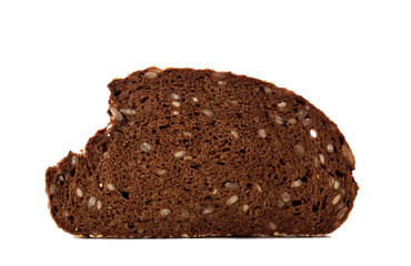 Slice of bread with seeds isolated on white