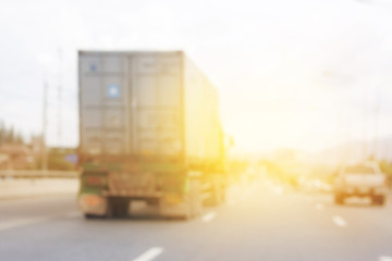 Abstract car motion lens blur background of street light at sunset time.