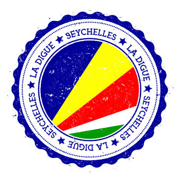 La Digue flag badge. Vintage travel stamp with circular text, stars and island flag inside it. Vector illustration.