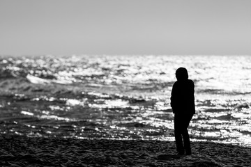 Fototapeta na wymiar Silhouette of women on the beach