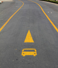 Road with direction bus sign