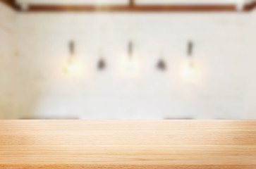 Selected focus empty brown wooden table and Coffee shop or resta