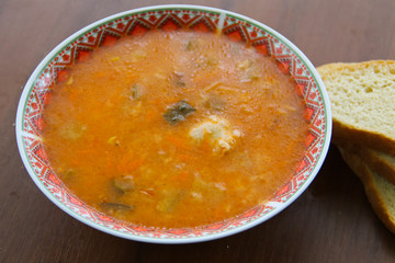 Traditional russian soup rassolnik with pickled cucumbers