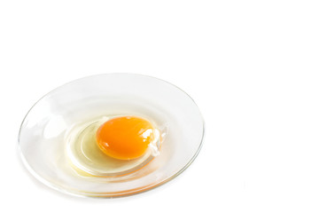 fresh homemade broken egg on a saucer