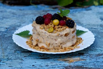 Delicious eaten berry cake on a white plate
