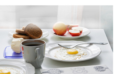 Healthy breakfast: fried egg and rye bread.