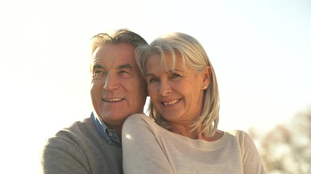 Portrait of senior couple embracing each other