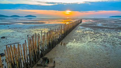 aerial photography at Sapan Hin park there have many interesting things to see the light house beside canal fishing birds life around the park.Bamboo weir waves from a canal When the ship sailed past.