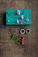 wrapping gifts in box for holiday top view mock up