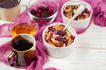 French toast casserole with cranberries, raspberries and blackbe