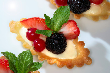 cake with strawberries and blackberries