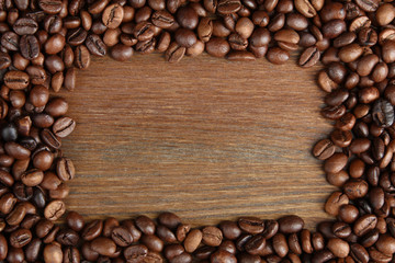 Background with roasted coffee in a frame.