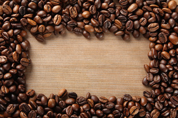 Background with roasted coffee in a frame.