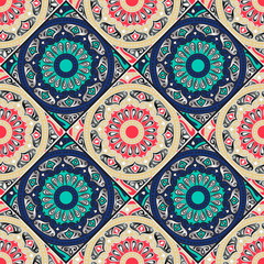 Colorful floral seamless pattern from different rhombus with mandala in patchwork boho chic style, in portuguese and moroccan motif