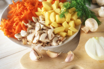 chopped ingredients for soup on plate