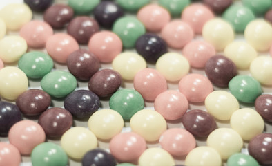 Multi colored pills or bubbles background close up